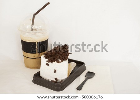 iced fresh roasted coffee popular drinks with chocolate cake delicious on background white