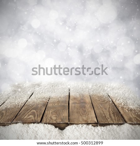 wooden desk space and frost with ice 