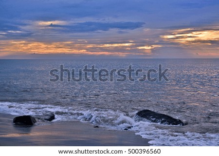 Glowing Golden Skies at Sunrise on the Beach