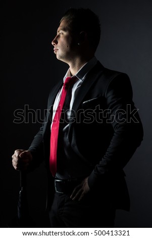 side portrait of elegant proud businessmann