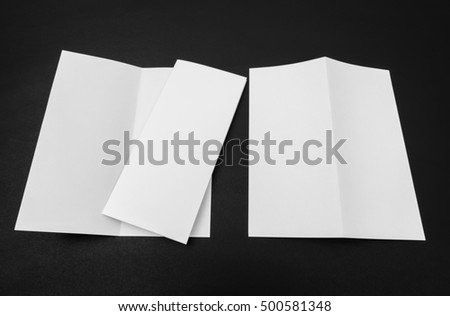 Bifold white template paper on black background