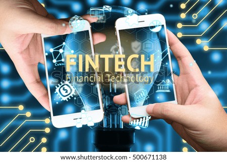 Fintech concept. Two hand holding mobiles phone and icons of financial technology. Light bulb , Infographic , texts and icons. Electric circuits graphic blue background