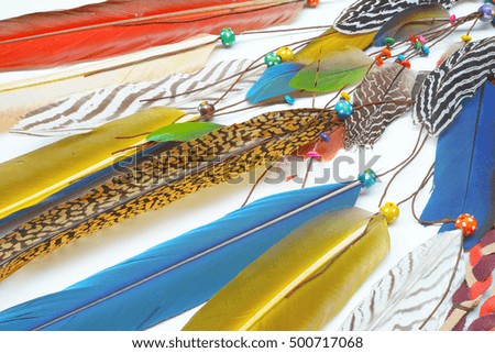 Decoration from feathers and gemstones. Boho style background