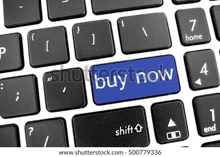 Flat black modern Keyboard of a laptop with Blue Button: buy now