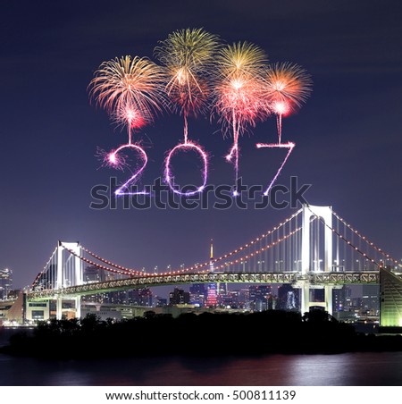 2017 New Year Fireworks celebrating over Tokyo Rainbow Bridge at Night, Odaiba, Japan