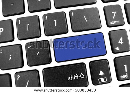 Flat black modern Keyboard of a laptop empty with Blue Button