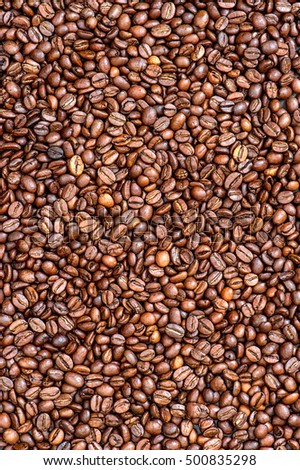 Brown coffee beans. Coffee background texture