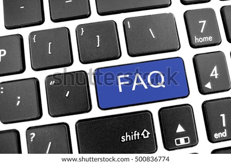 Flat black modern Keyboard of a laptop with Blue Button: FAQ
