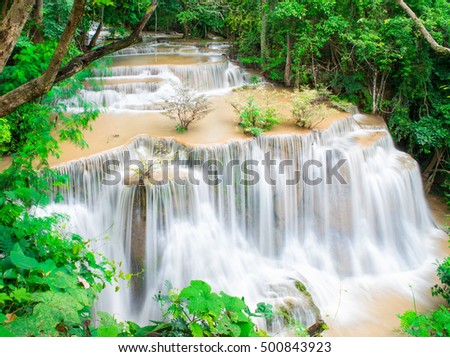 The beauty of the view flowing waterfalls cascaded down the top layer of a few, A limestone waterfall Rock Falls area will not slip ,"Huay Kamin" is one of the most beautiful waterfalls in Thailand