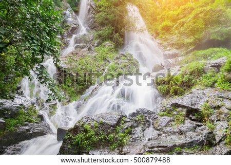Waterfall in forest on mountain at National Park Thailand.