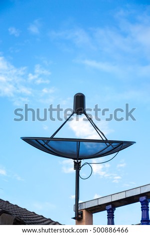 Satellite dish on a sky background  setup by repairman

