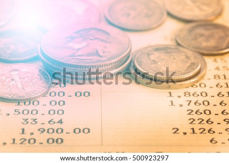 Coin stack on account book bank with retro color effected for finance and business concept