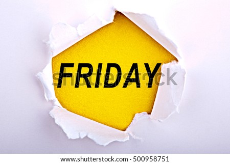 word Friday written on ripped paper. Business, technology, internet concept. Stock Photo