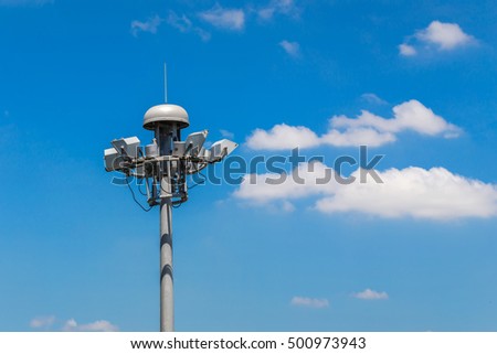 Multiple sport light with blue cloudy sky background.