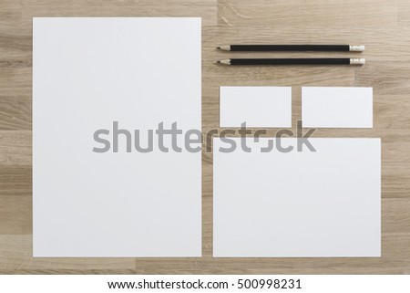 Mockup business brand template with business cards on wood background