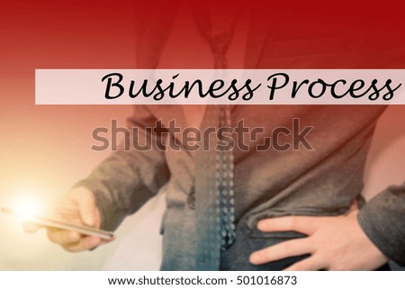 Hand writing Business Process with the young business man on background. Business concept. Stock Photo.