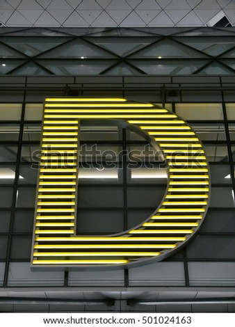 Neon letter D