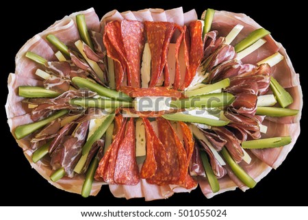 Traditional Serbian garnished gourmet welcome treat Appetizer Savory Dish Meze Isolated on Black Background