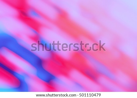 Colorful abstract blurred background. Multicolored abstract background holidays lights in motion blur image