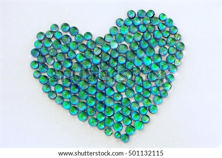 Distinctive Dynamic Creative Blue Dichroic Glass Beads in a Decorative Heart Shape.