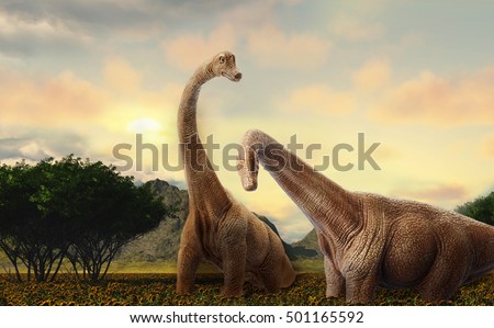 dinosaur fight scene of the two dinosaurs fighting each Royalty-Free Stock Photo #501165592