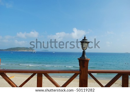 Gazebo on the railing and the sea background