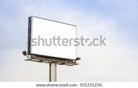 Blank billboard or poster for outdoor advertising. Blank billboard on highway. Big blank billboard for advertisement.
