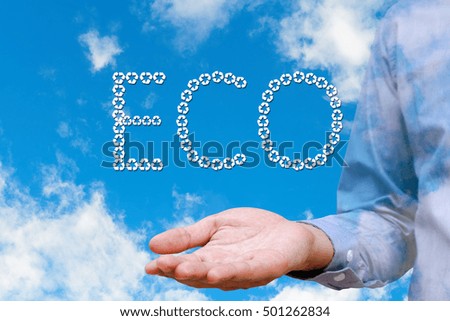 Man holding text eco and blue sky background with white clouds, Environment concept