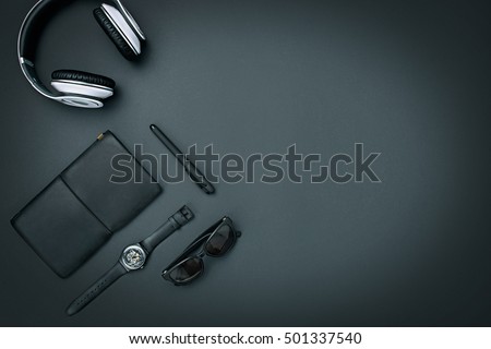 Still life of casual man. Modern male accessories on black background Royalty-Free Stock Photo #501337540