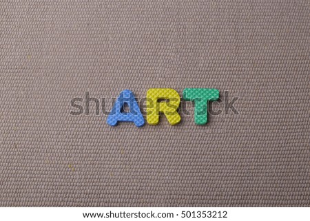 Colorful wording of ART on canvas background.