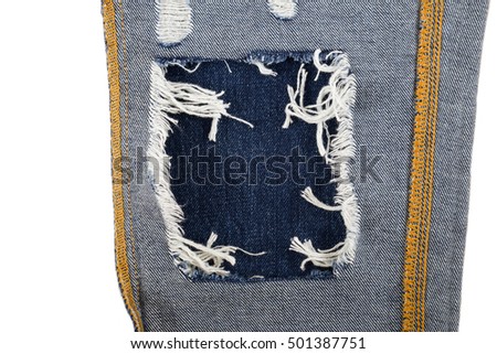 blue jean texture with a hole and threads showing