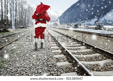 red old santa claus and winter road 