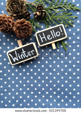 Winter. Hello winter. Shabby winter. Rustic winter. Winter chalkboards. Christmas. New Year. Blue textile with white stars for winter.