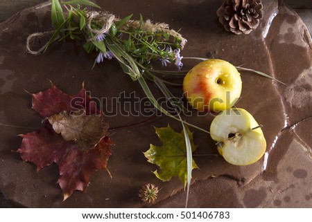 mock up autumn leaf colorful apple wet and flower on stone background