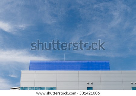 The Modern building on blue sky background