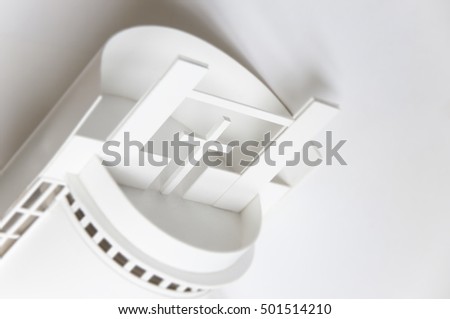 Abstract architectural white background with space for text. Model of nonexistent contemporary round church close up, selective focus.