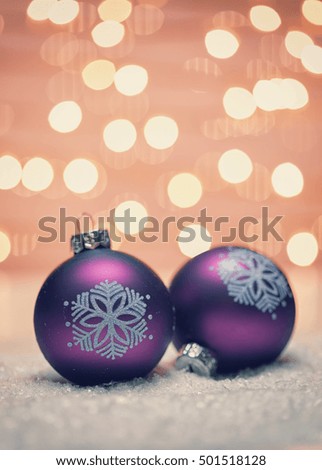 Christmas Ornaments in the Snow 
