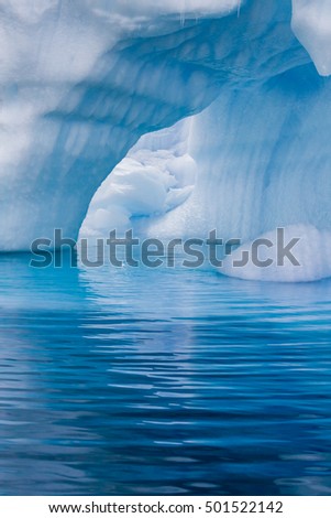 Icebergs and ice blue water of Antarctica