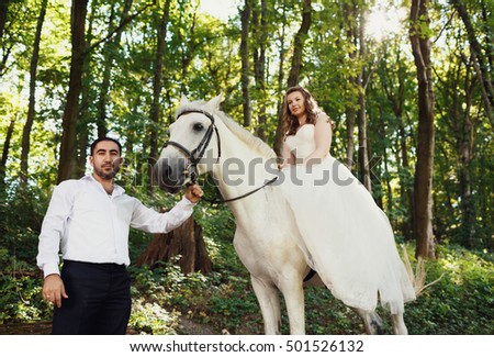 Romantic riding a horse