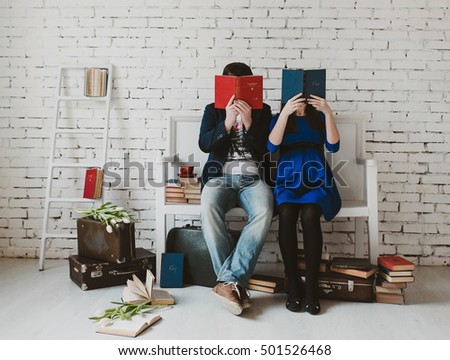 Young family are reading books Royalty-Free Stock Photo #501526468