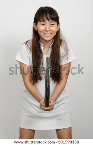 Happy tennis player woman