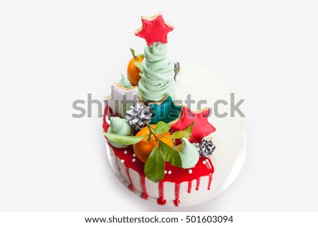 Christmas and New Year cake with marshmallow Christmas tree and gingerbread