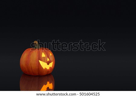 large Halloween jack o lantern Pumpkin on a dark background