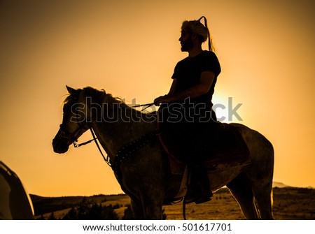riding a horse