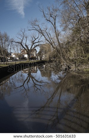 Picturesque canal and park along a tourist walk in the popular riverside resort of El Tigre near Buenos Aires