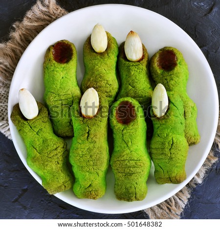 Witch finger cookies for Halloween, selective focus