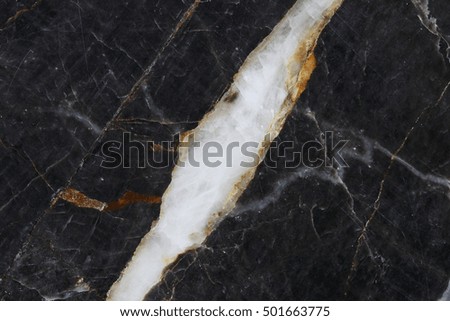 Close up Dark gray marble pattern (Gold Russia) texture background for design.