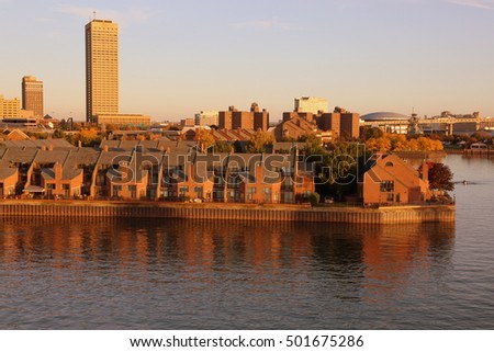 Buffalo, NY - City Skyline At Sunset In October With Clear Sky And Harbor With Reflection