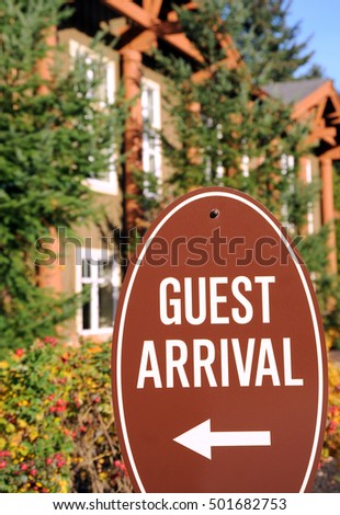 Guest arrival sign displayed outdoors.
