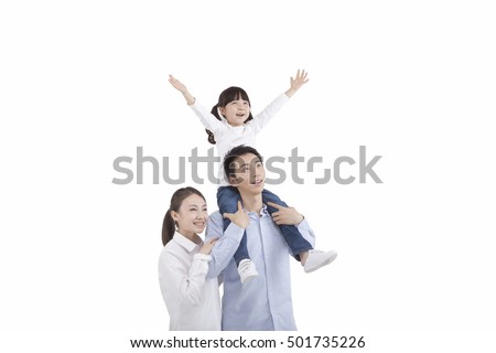 	Portrait of daughter riding father's neck,looking up with parents,daughter holding up arms	